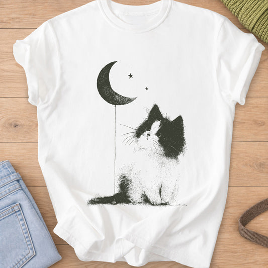 Fluffy cat gazing up at a crescent moon tied to a balloon string, two stars, dark charcoal ink on a White T-Shirt
