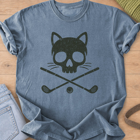 Cat skull with whiskers over crossed golf clubs and a golf ball, dark charcoal ink on a Blue Jean T-Shirt