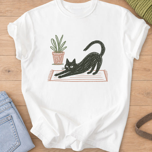 Black cat in a long stretch on a striped rug beside a potted plant on a White T-Shirt
