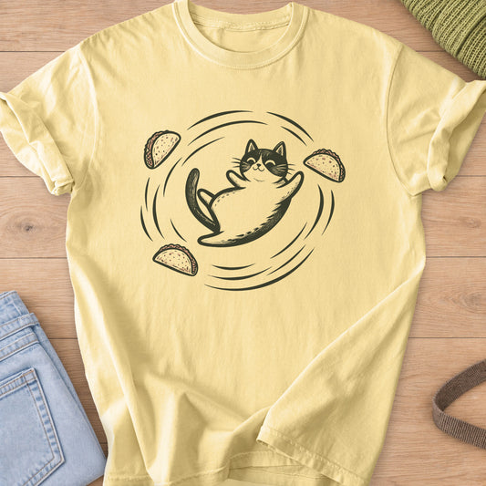 Smiling tuxedo cat rolling on its back as tacos swirl around it on a Butter T-Shirt