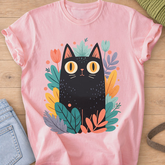 Wide-eyed black cat sitting among leafy plants, tulips and little dots on a Blossom T-Shirt