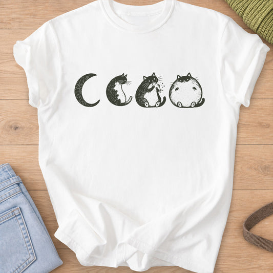 Four cats as moon phases, one eating a fish, ending in a round chubby full moon, dark charcoal ink on a White T-Shirt