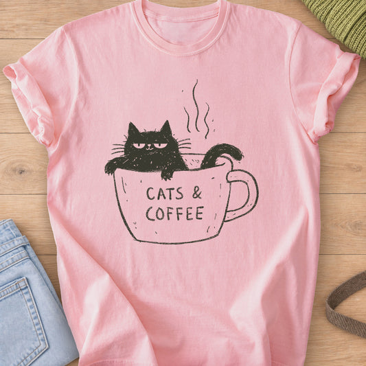 Grumpy black cat sitting in a steaming mug that reads "CATS & COFFEE", dark charcoal ink on a Blossom T-Shirt