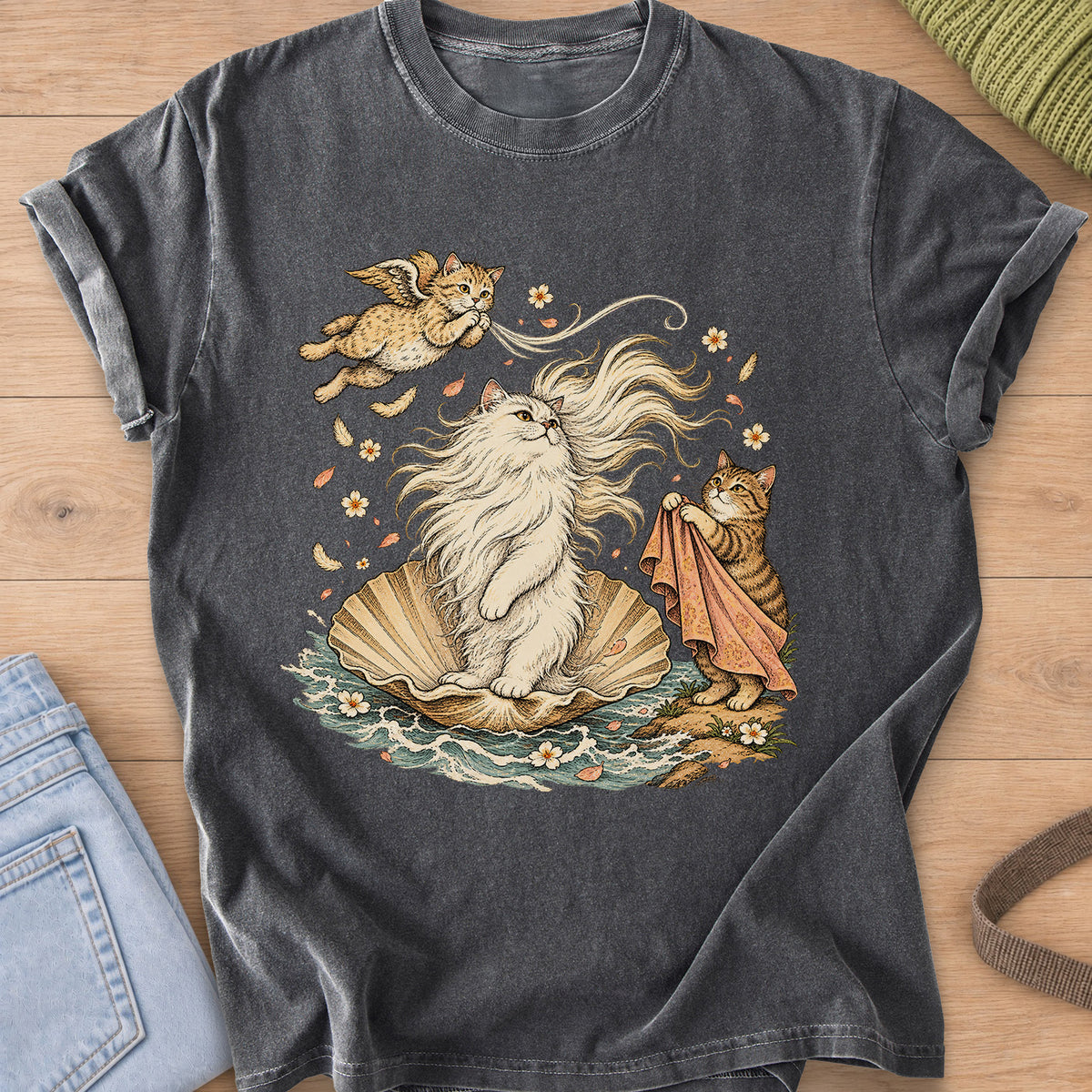Fluffy cat on a seashell in the waves with a winged cat and a tabby holding a cloth on a Pepper T-Shirt
