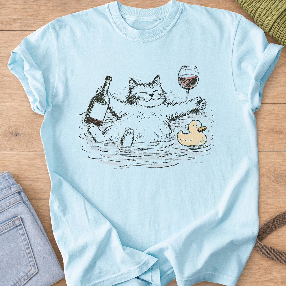 Smiling fluffy cat soaking in a bath with wine bottle, wine glass and rubber duck on a Chambray T-Shirt