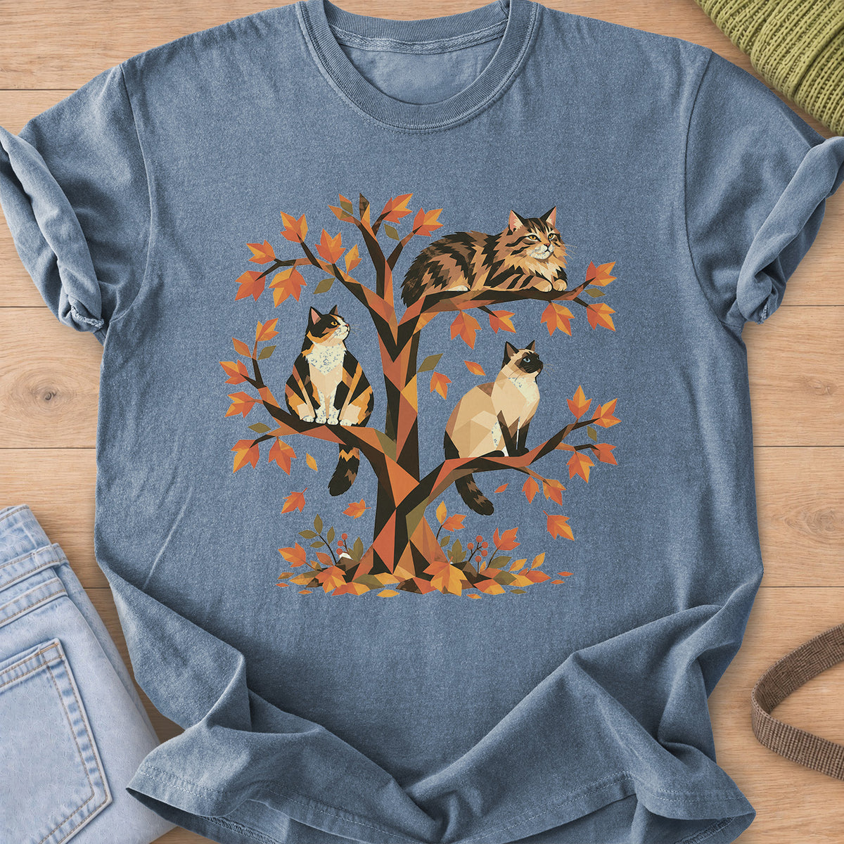 Calico, tabby and Siamese cats perched in a geometric autumn tree with leaves on a Blue Jean T-Shirt