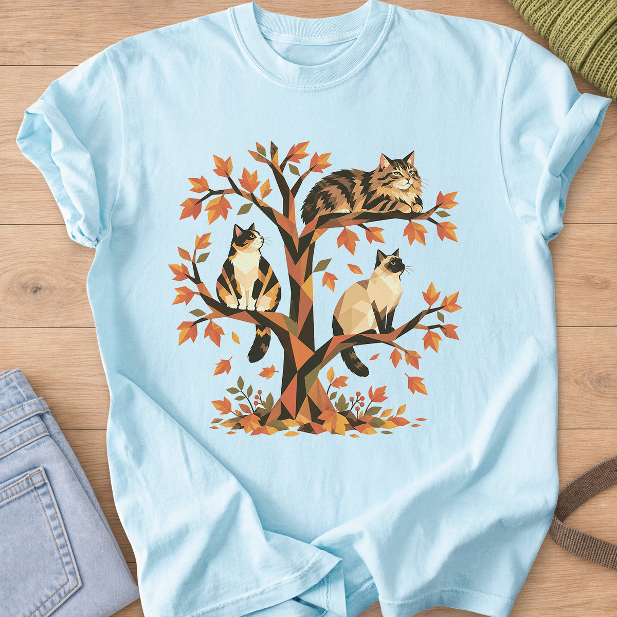Calico, tabby and Siamese cats perched in a geometric autumn tree with leaves on a Chambray T-Shirt