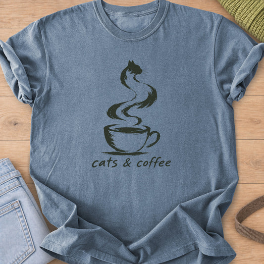 Steam from a coffee cup curling into a cat shape, with the words "cats & coffee", dark green ink on a Blue Jean T-Shirt