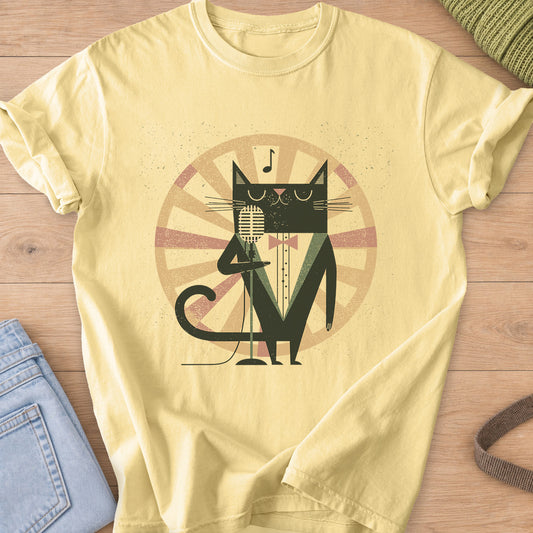 Black cat in a tuxedo and bow tie singing into a vintage mic before a sunburst on a Butter T-Shirt
