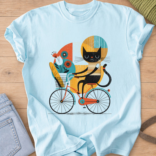 Black cat riding a bicycle with a baguette and flowers in its front basket on a Chambray T-Shirt