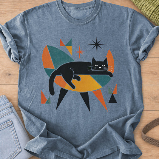 Sleeping black cat draped over a retro geometric chair with stars and triangles on a Blue Jean T-Shirt
