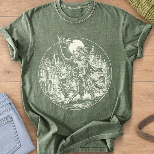 Armored cat carrying a frog knight with a flag past castle towers and a full moon, cream ink on a Moss T-Shirt