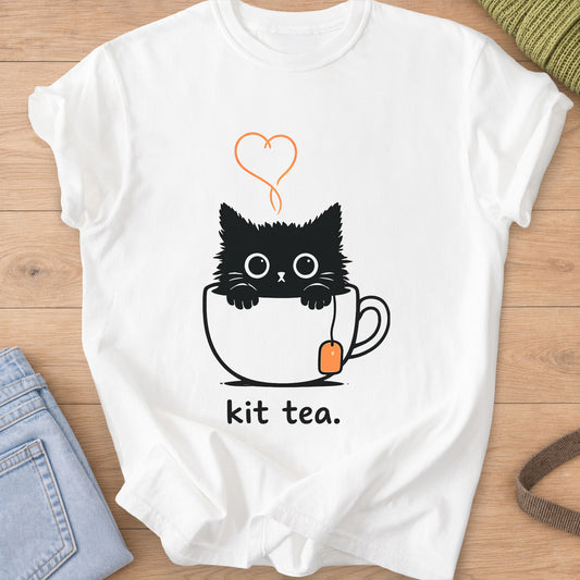 Black kitten peeking out of a teacup under a heart of steam, with "kit tea." below on a White T-Shirt