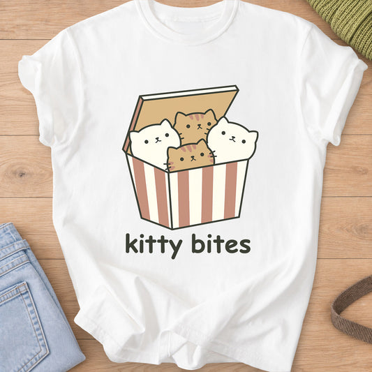 Four kittens peeking out of a striped takeout box above the words "kitty bites" on a White T-Shirt