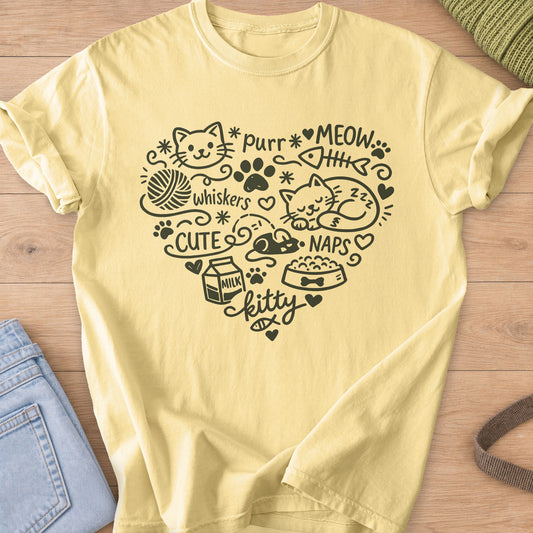 Heart of cat doodles with a sleeping cat, yarn, paw prints and the word "kitty", dark charcoal ink on a Butter T-Shirt