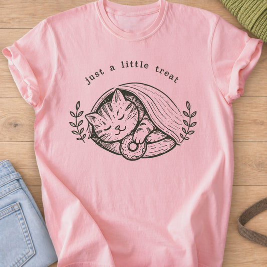 Tabby cat asleep under a blanket holding a donut, framed by laurel sprigs, dark charcoal ink on a Blossom T-Shirt