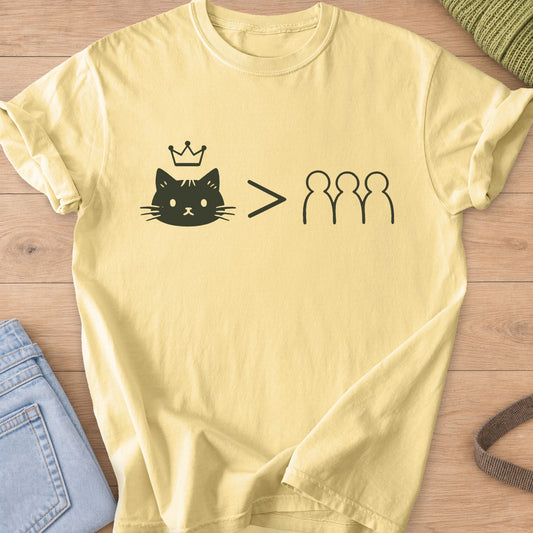 Crowned cat face with a greater-than sign before three outlined human figures, dark charcoal ink on a Butter T-Shirt