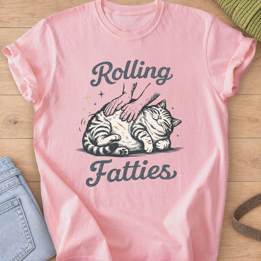 Chubby tabby cat rolled on its side under two petting hands, 'Rolling Fatties' on a Blossom T-Shirt