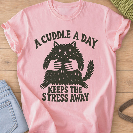 Startled fluffy cat held by two hands, "A cuddle a day keeps the stress away", dark charcoal ink on a Blossom T-Shirt