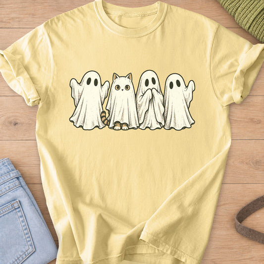 Cat wearing a ghost sheet, tabby tail and paws peeking out, beside three ghosts on a Butter T-Shirt