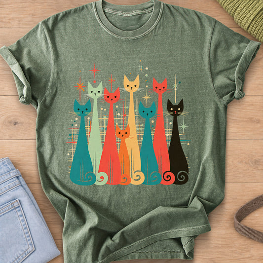 Row of eight tall slender cats with spiral tails among starbursts and dots on a Moss T-Shirt