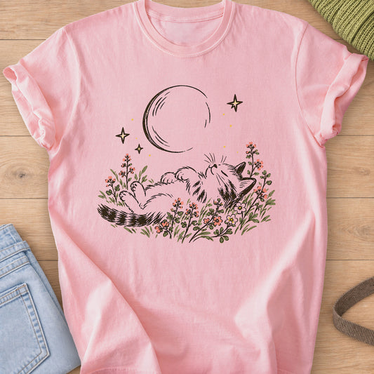 Tabby cat napping on its back in wildflowers under a crescent moon and stars on a Blossom T-Shirt