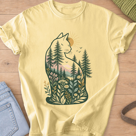 Cat silhouette filled with pine trees, mountains and wildflowers, sun and birds on a Butter T-Shirt