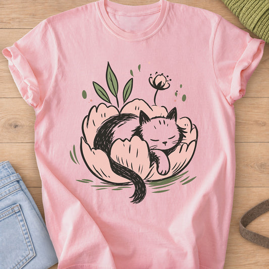 Fluffy cat curled up asleep inside a big flower bloom with leaves and a bud on a Blossom T-Shirt