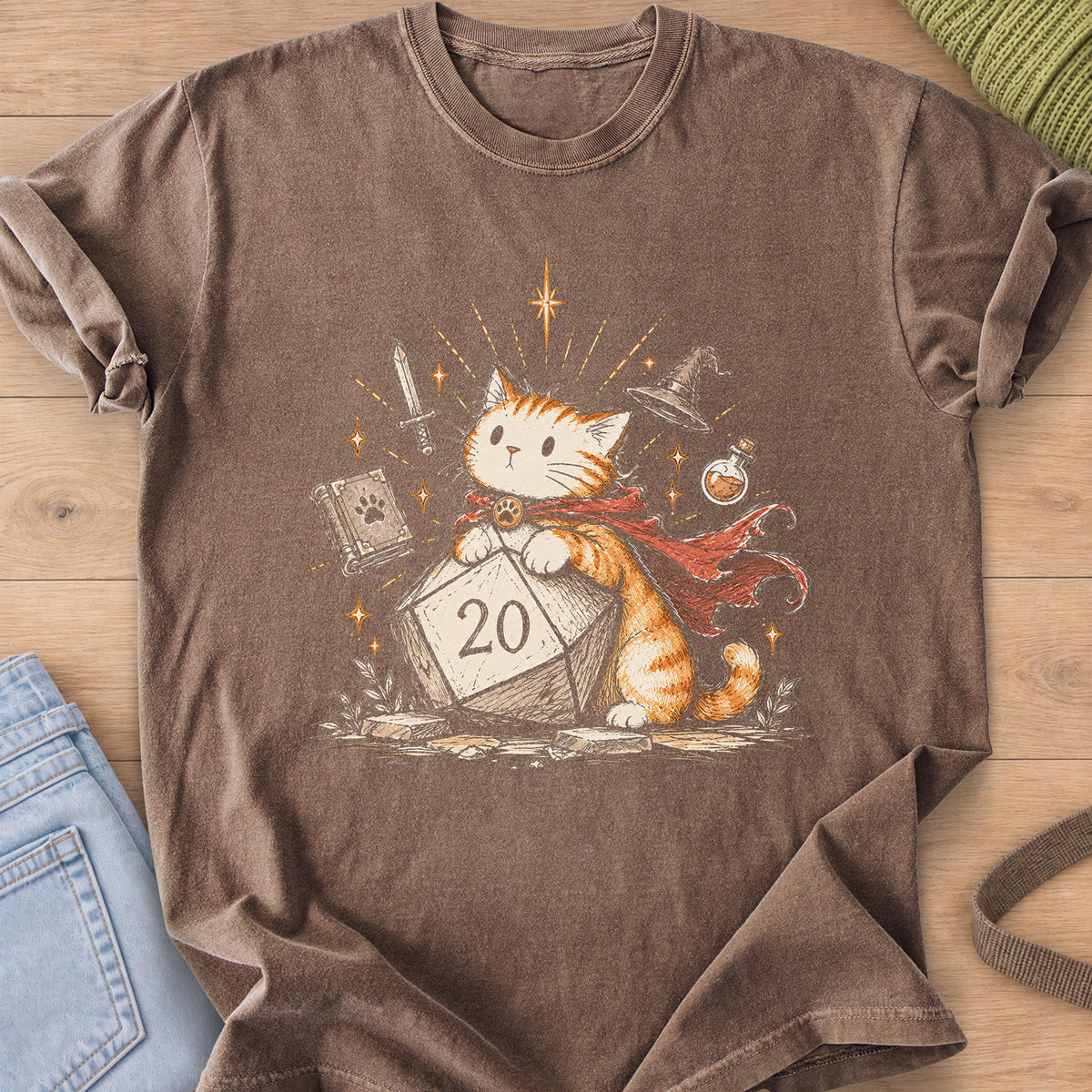 Caped tabby cat leaning on a 20-sided die, sword, spellbook, wizard hat and potion on an Espresso T-Shirt
