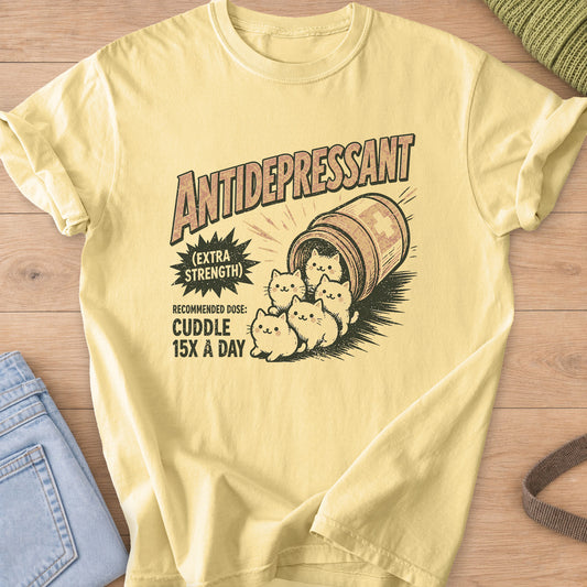 Five kittens tumbling out of a tipped pill bottle, "Cuddle 15X a day" on a Butter T-Shirt