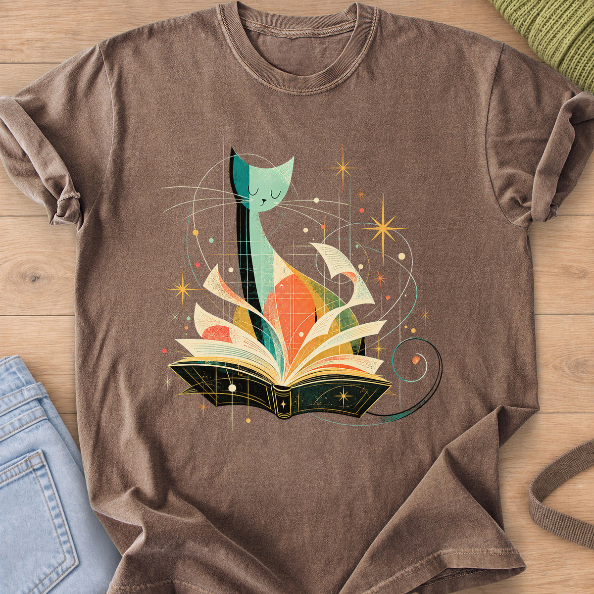 Tall slender cat with closed eyes behind an open book, flying pages and stars on an Espresso T-Shirt