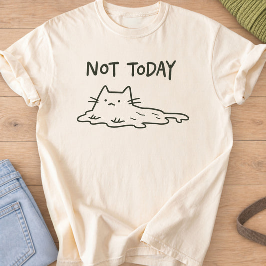 Simple cat melting into a puddle below the words "NOT TODAY", dark charcoal ink on an Ivory T-Shirt