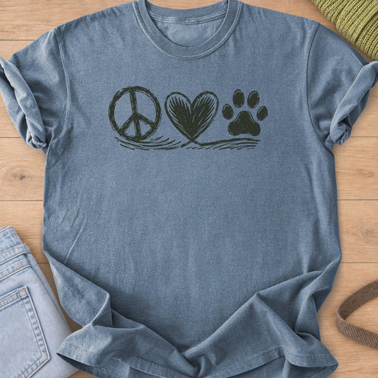 Hand-drawn peace sign, heart and cat paw print in a row above loose swoosh lines, dark charcoal ink on a Blue Jean T-Shirt