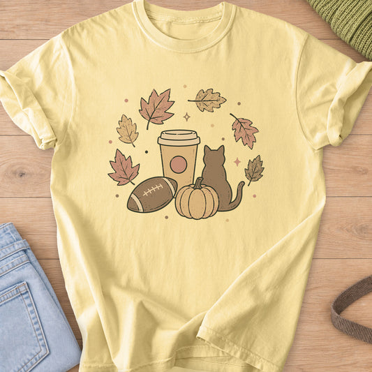 Cat seen from behind by a pumpkin, coffee cup and football in a ring of fall leaves on a Butter T-Shirt