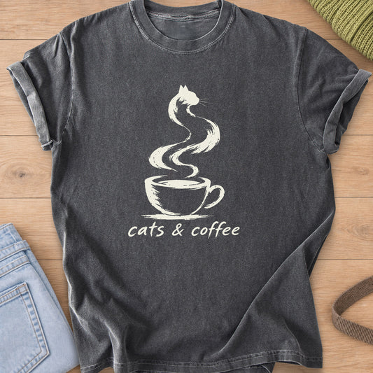 Steam from a coffee cup curling into a cat shape, with the words "cats & coffee", cream ink on a Pepper T-Shirt