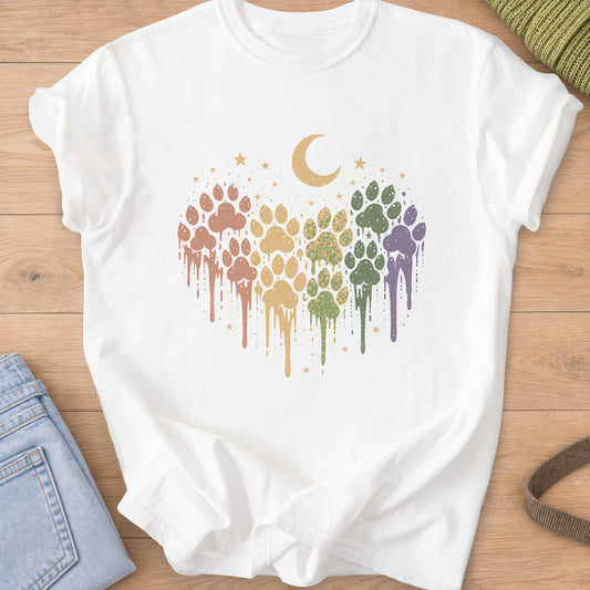 Paw prints in a dripping paint heart under a crescent moon and scattered stars on a White T-Shirt