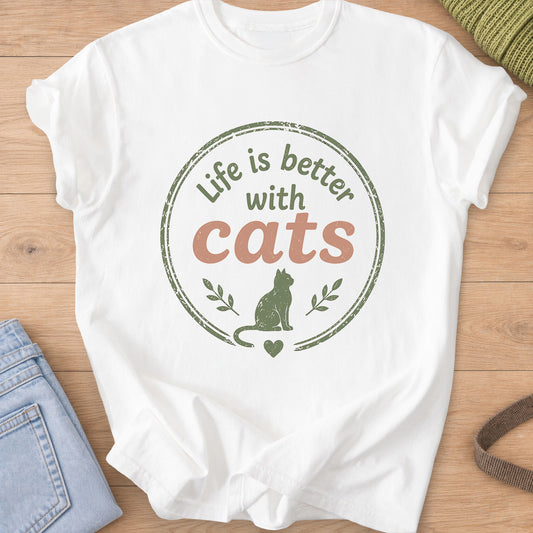 Sitting cat in a round badge reading "Life is better with cats", green and terracotta ink on a White T-Shirt